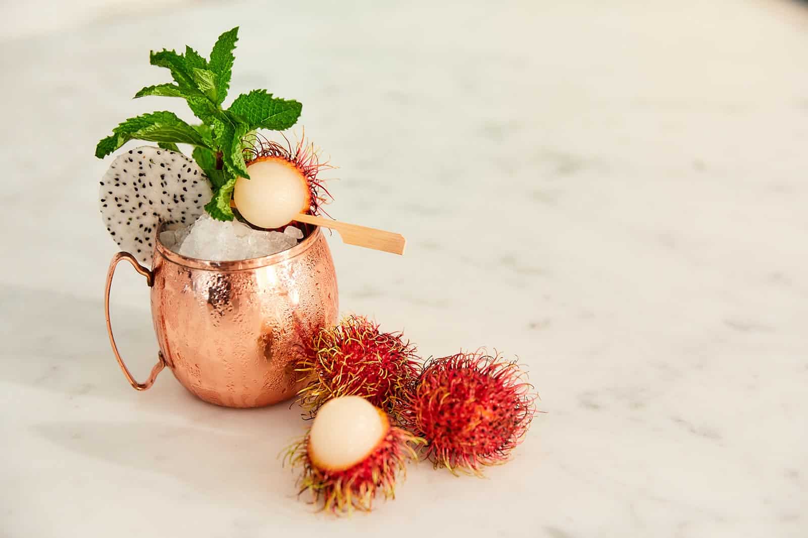 Tropical dragon fruit and rambutan moscow mule cocktail recipe